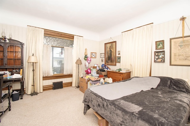 bedroom with light colored carpet