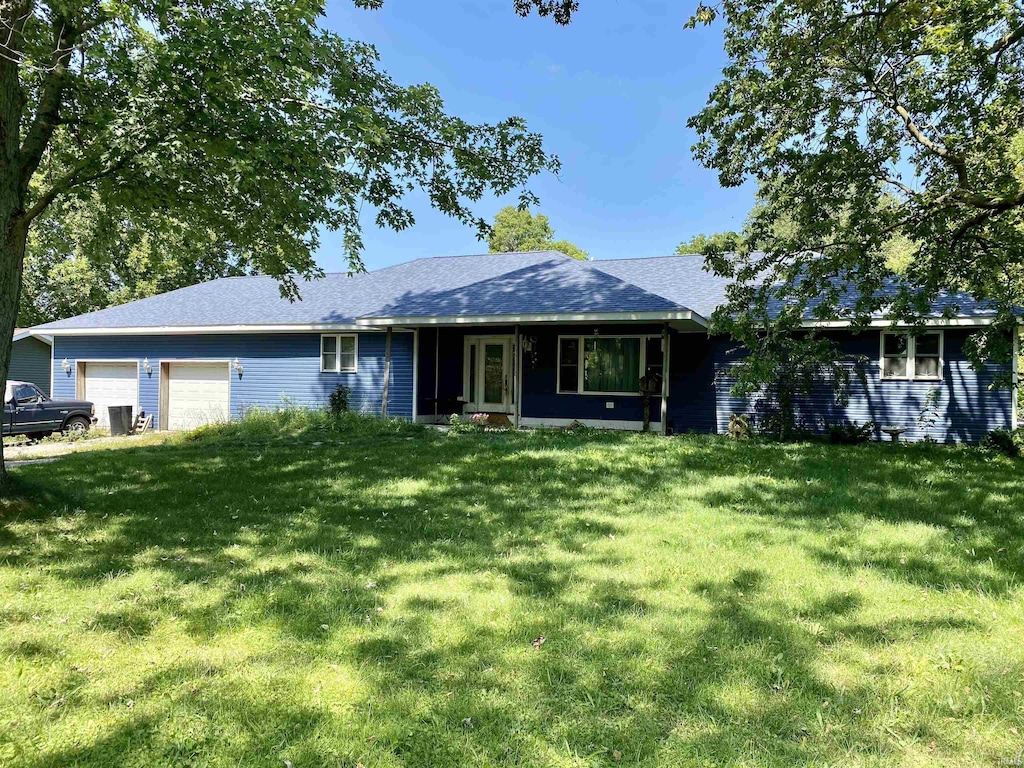 7222 W 250 Rd N, Wabash, IN 46992 - single story home with a front lawn and a garage