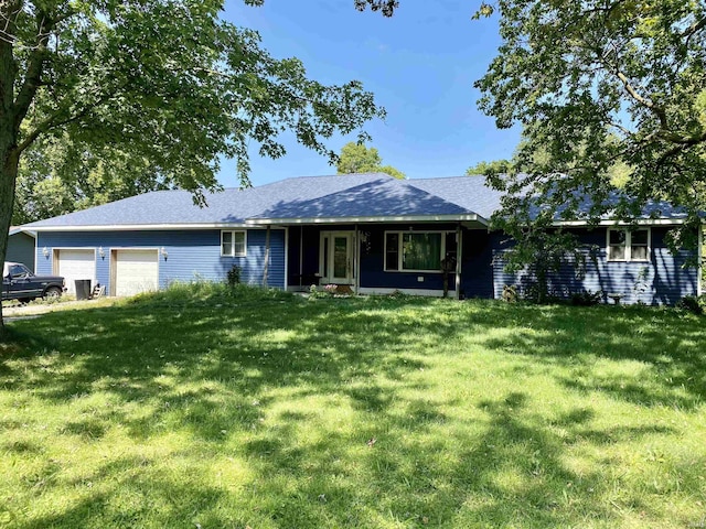 7222 W 250 Rd N, Wabash, IN 46992 - single story home with a front lawn and a garage