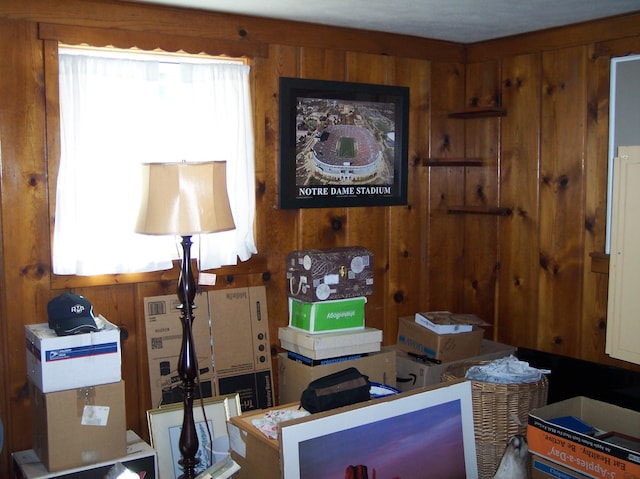 interior space featuring wood walls