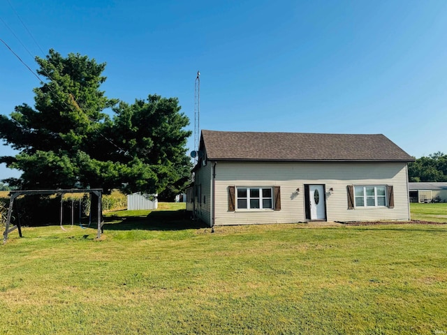 view of front of property with a front lawn