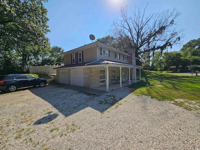 exterior space with a porch and a front yard