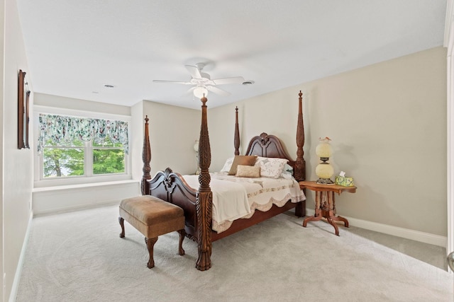 bedroom featuring baseboards, ceiling fan, and carpet floors