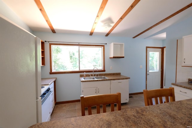 kitchen featuring sink, white cabinetry, light tile patterned flooring, and white appliances