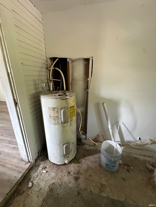 utility room with water heater