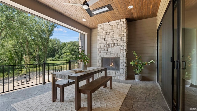 view of patio featuring ceiling fan