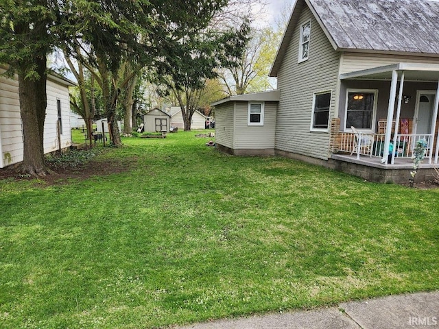 view of yard featuring a porch