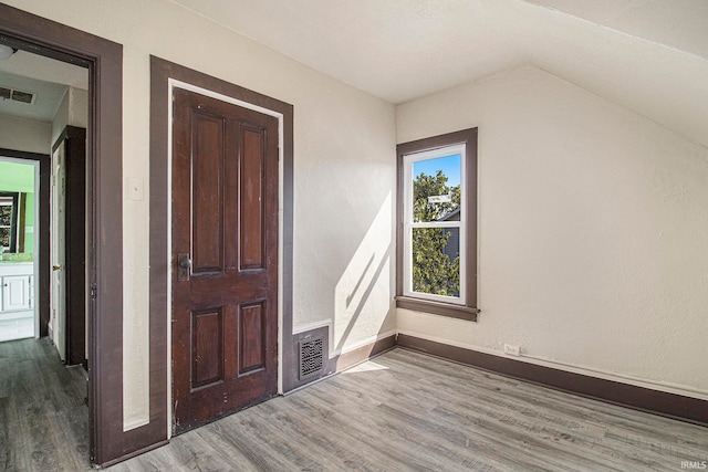 interior space with hardwood / wood-style floors