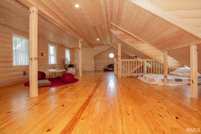 additional living space featuring wood ceiling, vaulted ceiling, and wood-type flooring