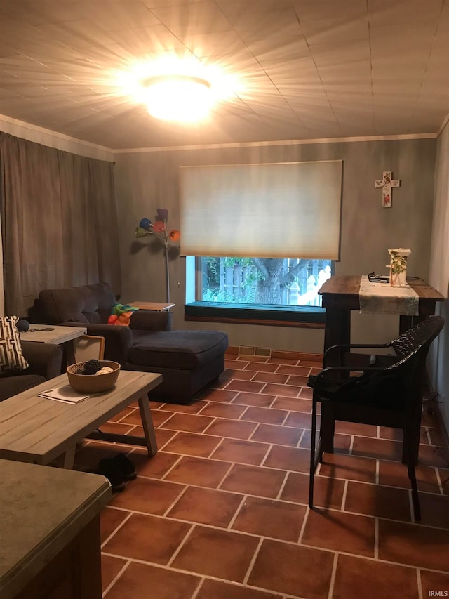 tiled living area with ornamental molding