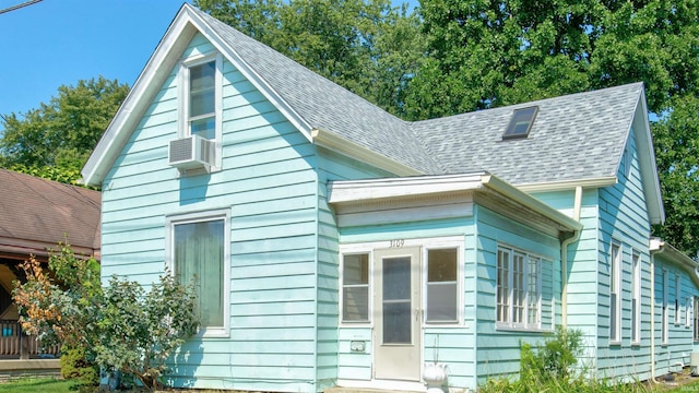 view of home's exterior featuring cooling unit