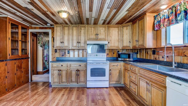 bonus room featuring carpet flooring and vaulted ceiling