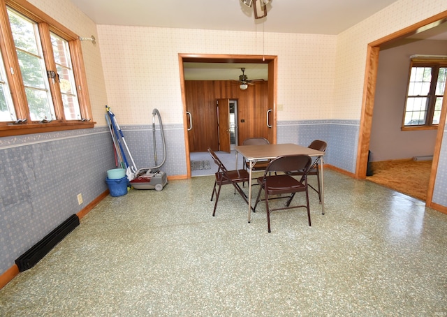 dining room with a healthy amount of sunlight and ceiling fan