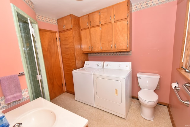 laundry area with independent washer and dryer