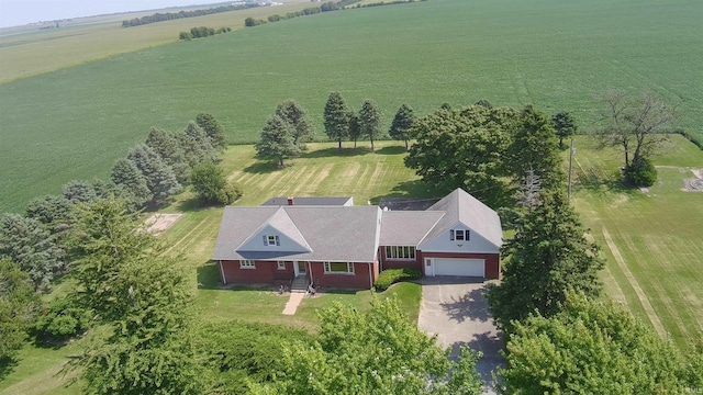 birds eye view of property with a rural view