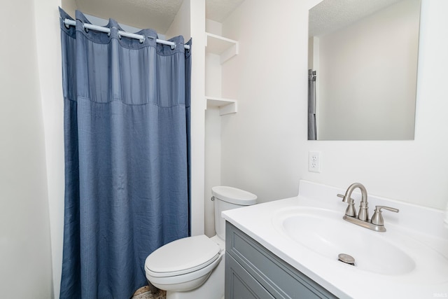 bathroom featuring a textured ceiling, vanity, toilet, and a shower with curtain