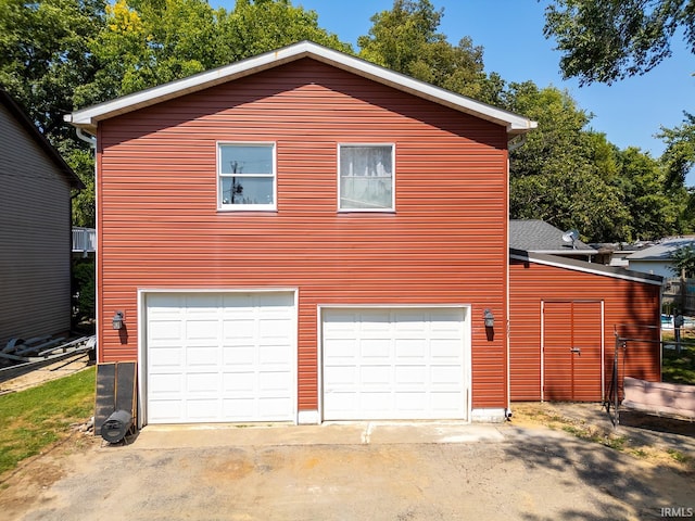 exterior space featuring a garage