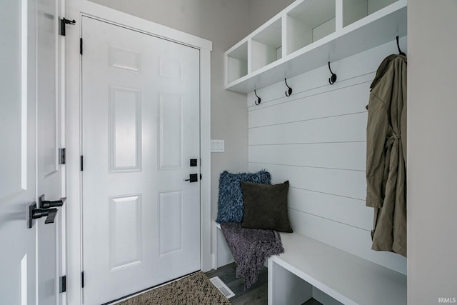 mudroom with wood-type flooring