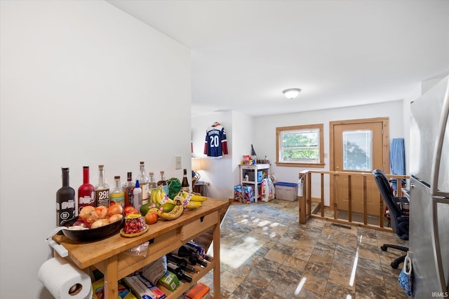 interior space featuring stone finish flooring