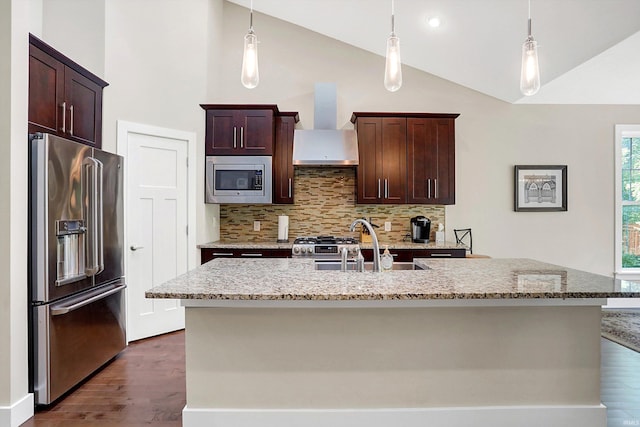 kitchen with appliances with stainless steel finishes, backsplash, dark hardwood / wood-style flooring, and vaulted ceiling