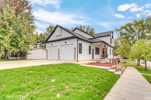 modern farmhouse featuring a porch and a front lawn