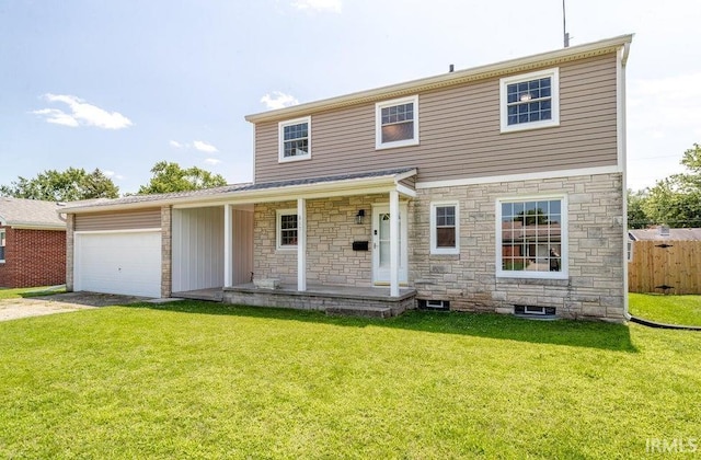 view of front of property featuring a garage, driveway, fence, a porch, and a front yard