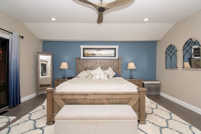 bedroom featuring lofted ceiling, wood finished floors, and recessed lighting