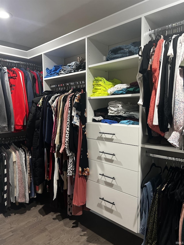 spacious closet with wood finished floors