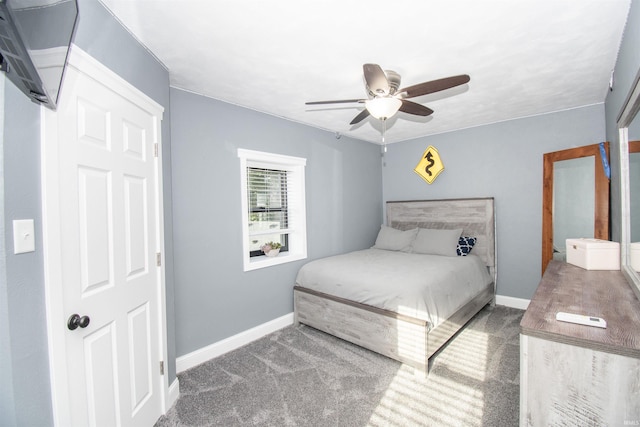 bedroom featuring carpet, a ceiling fan, and baseboards