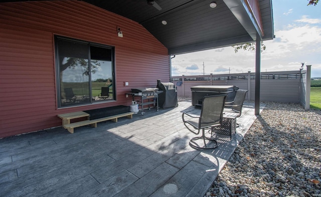 view of patio / terrace with fence and area for grilling