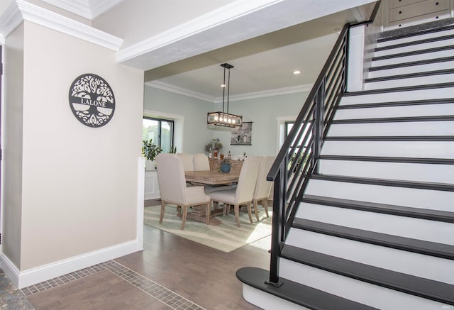 dining space featuring recessed lighting, baseboards, stairs, ornamental molding, and dark wood finished floors