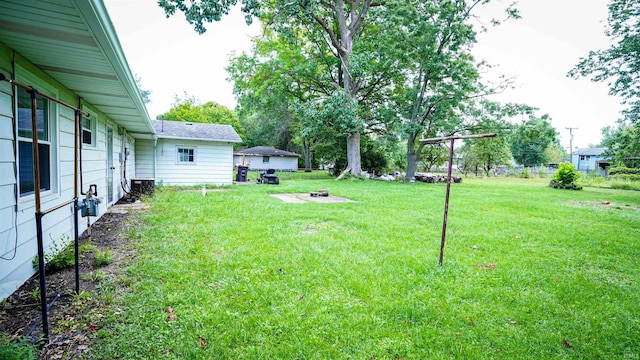 view of yard with central AC unit