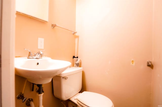 bathroom featuring toilet