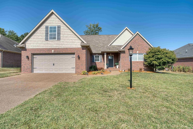 view of front of home with a garage and a front yard