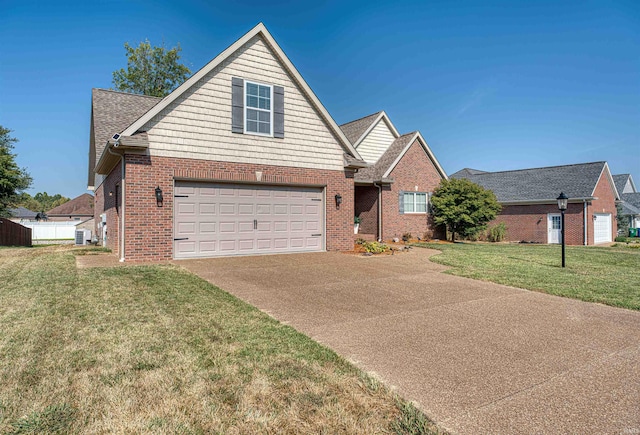 front facade with a garage, central AC, and a front yard