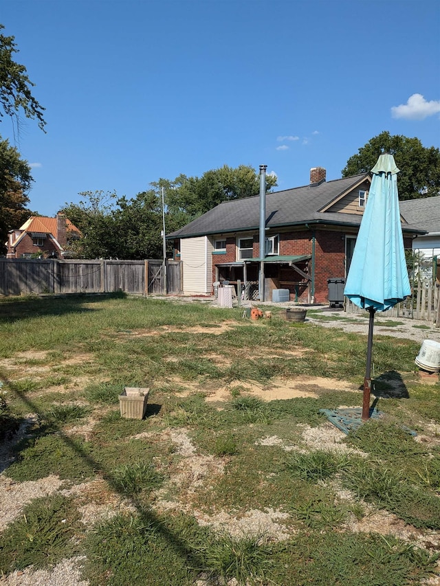 view of yard featuring fence