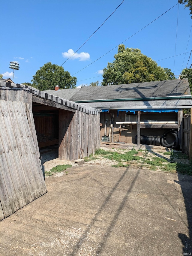 exterior space featuring an outdoor structure