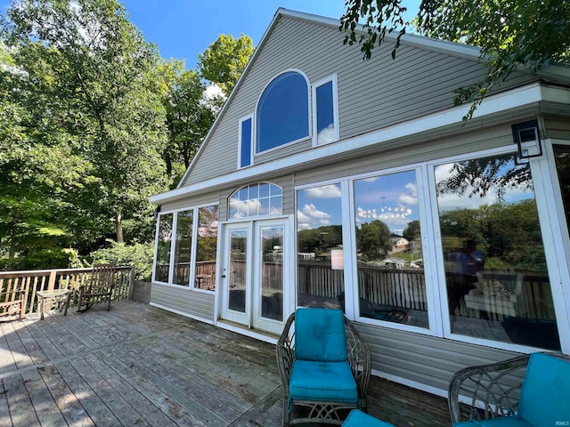 deck with a sunroom