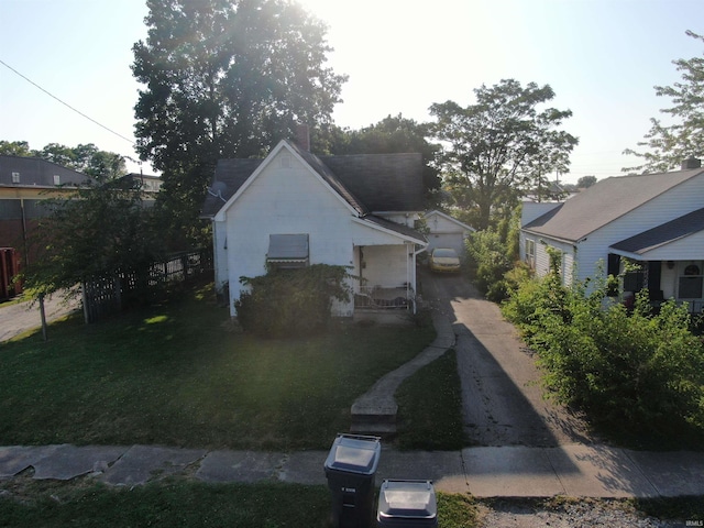 view of property exterior with a lawn