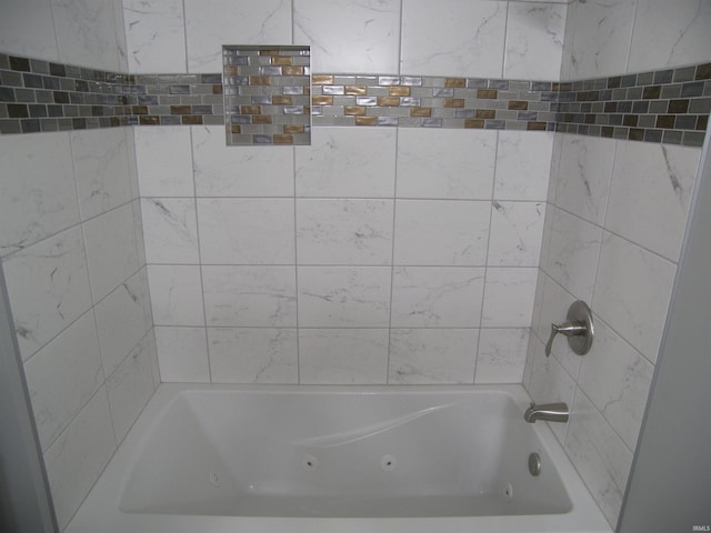 bathroom featuring a combined bath / shower with jetted tub