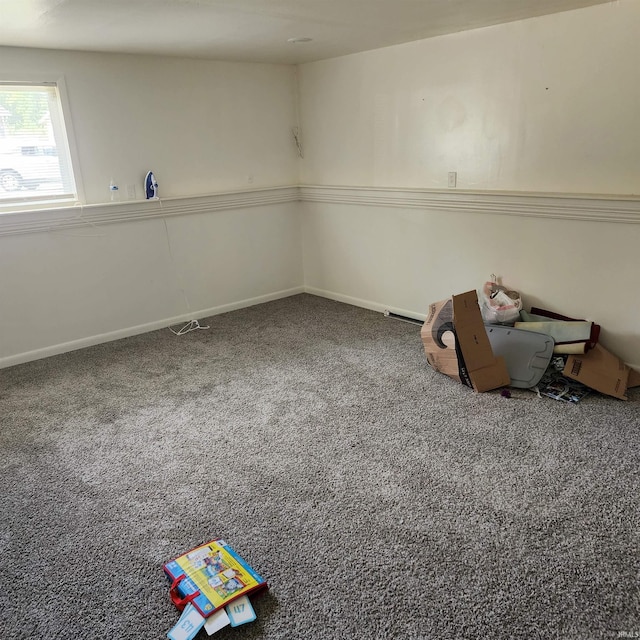 interior space featuring carpet