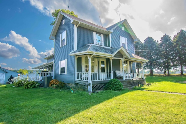 view of front of home featuring covered porch and a front yard