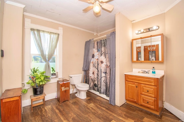 bathroom featuring ornamental molding, vanity, toilet, and hardwood / wood-style floors