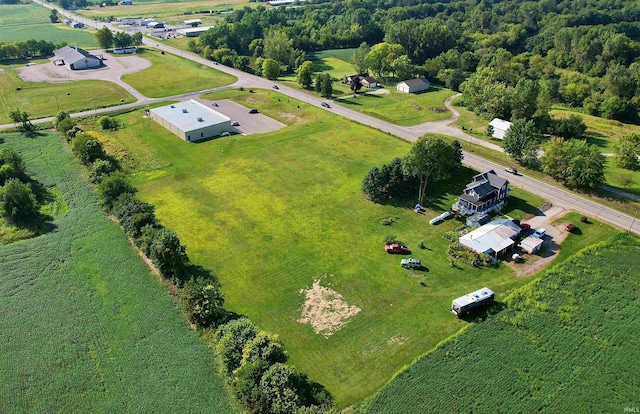 birds eye view of property featuring a rural view