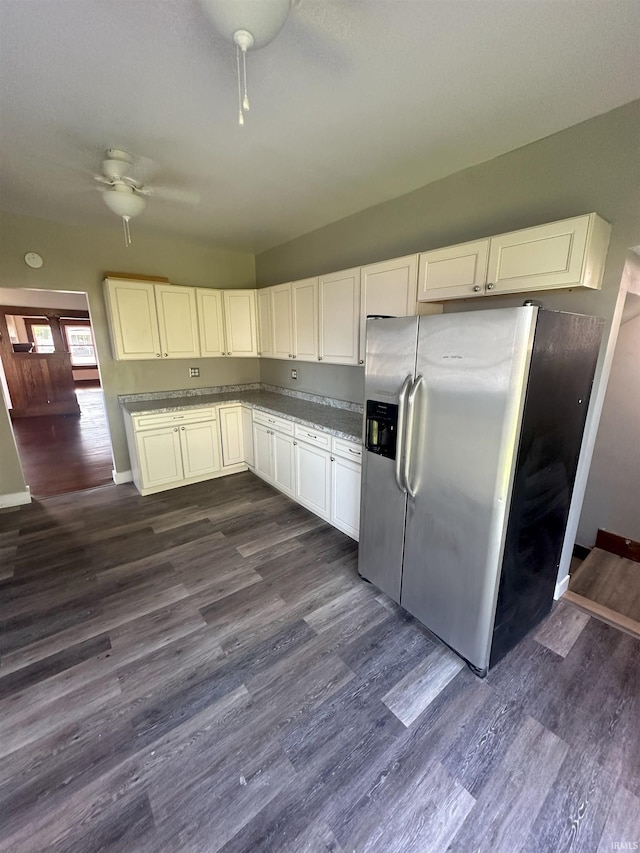 kitchen with ceiling fan, dark hardwood / wood-style floors, white cabinetry, and stainless steel refrigerator with ice dispenser