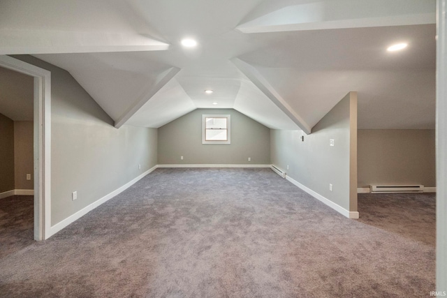 additional living space featuring carpet, a baseboard heating unit, vaulted ceiling, baseboards, and recessed lighting
