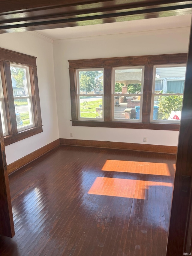 unfurnished room featuring dark hardwood / wood-style floors