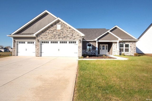 3508 Collier Dr, Lafayette, IN 47905 - craftsman inspired home featuring stone siding, board and batten siding, an attached garage, and a front yard