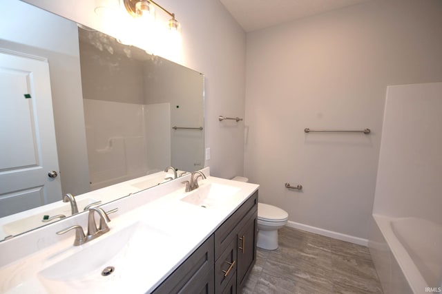 full bathroom with vanity, independent shower and bath, and toilet