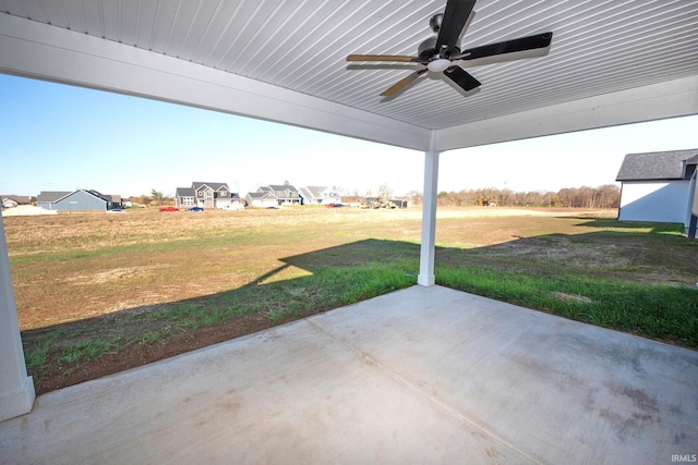 view of patio with ceiling fan